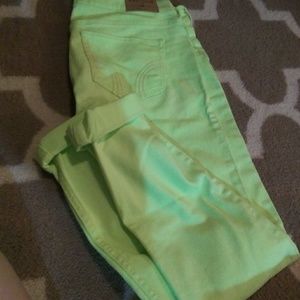 Neon green Hollister skinny jeans